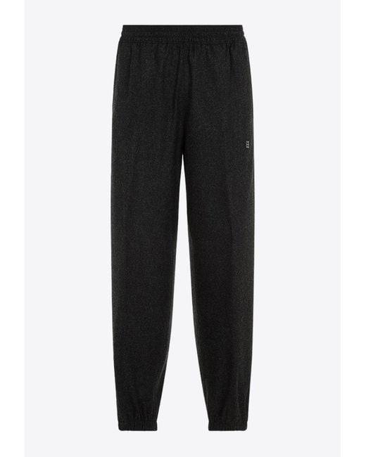 Givenchy Black Logo Wool Track Pants for men
