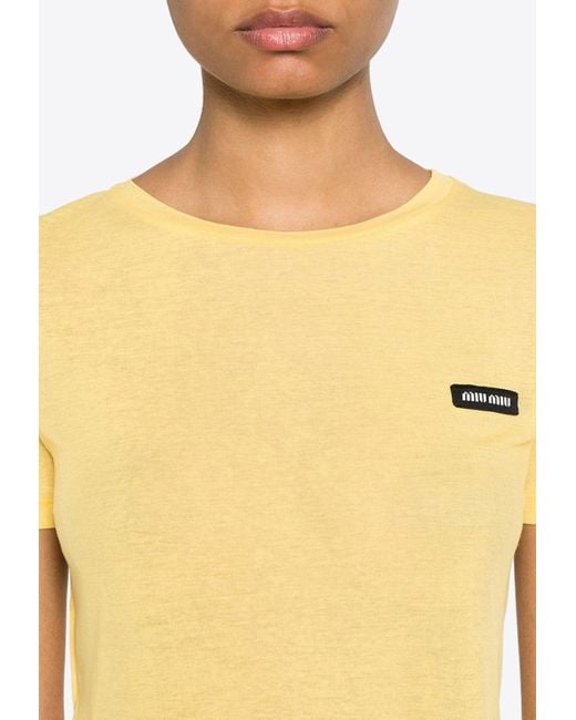 【MIUMIU】お洒落☆lady's ロゴ シアー 半袖シャツ yellow Miu Miu Logo Patch Sheer Cropped T-Shirt in Yellow | Lyst
