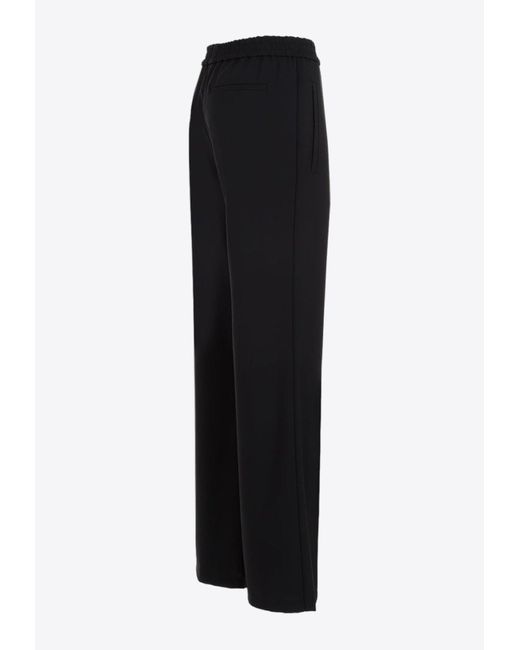 Loewe Flared Wool Pants in Black Lyst
