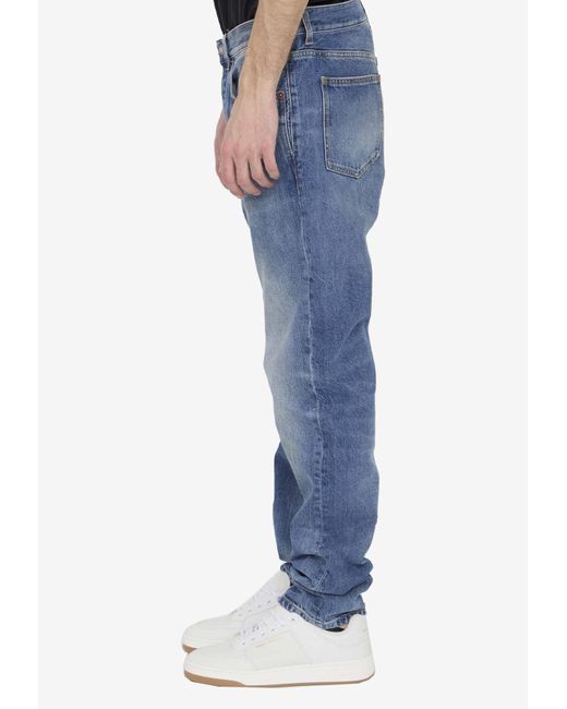 Saint Laurent Blue Low-Rise Washed-Out Jeans for men