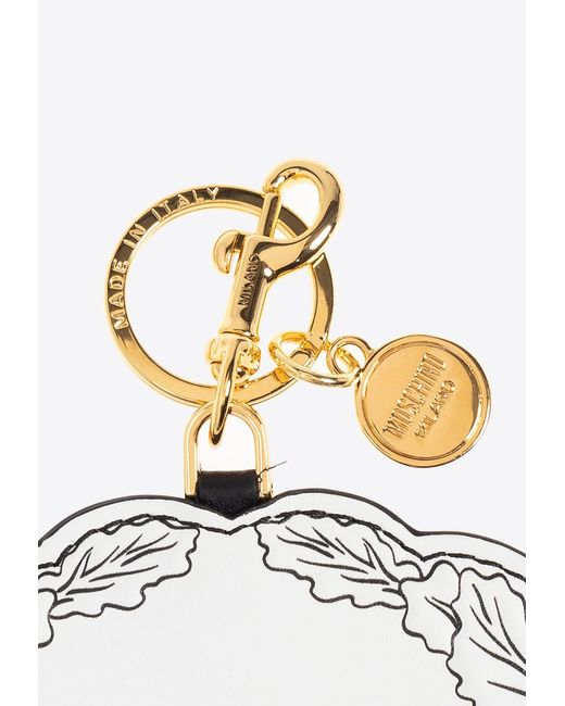 Moschino White Graphic Scroll And Leaf Pattern Leather Keychain for men