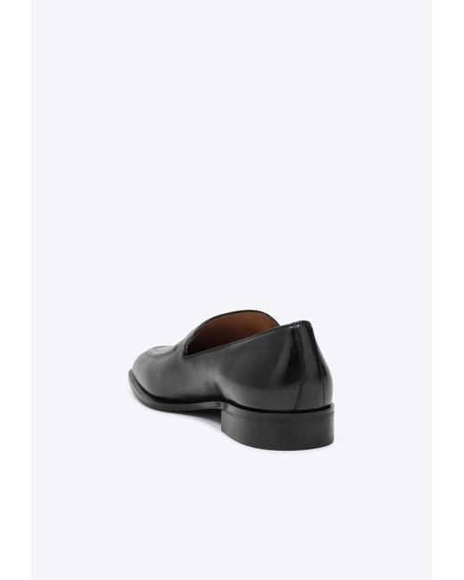 Miu Miu Black Embossed Logo Leather Loafers