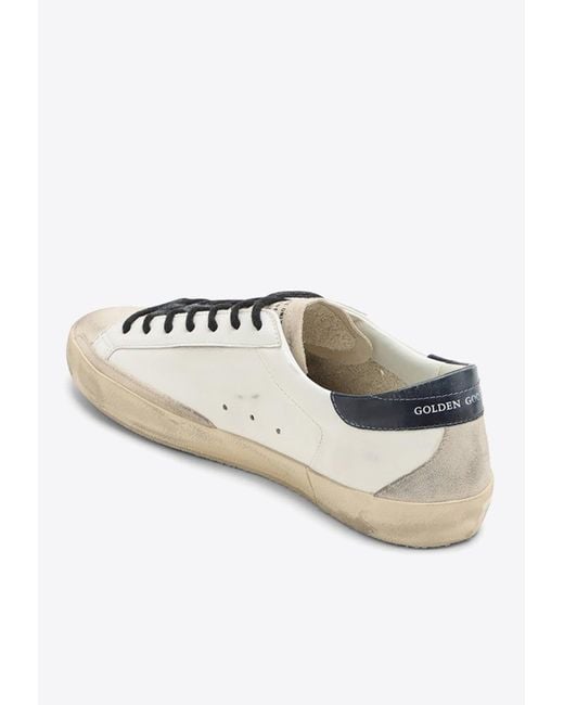 Golden Goose Deluxe Brand White Super-Star Distressed Low-Top Sneakers for men