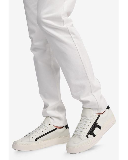 white ferragamo sneakers