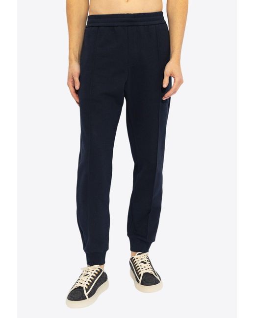 Versace Blue Logo Embroidered Track Pants for men