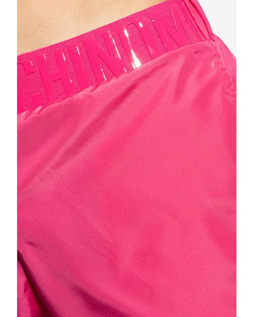 Moschino Pink Rubberized Logo Swim Shorts for men
