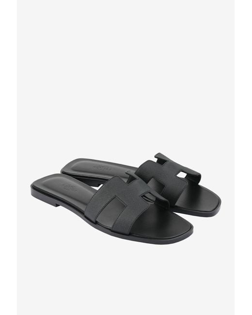Hermès Black Izmir H Cut-out Sandals In Calf Leather