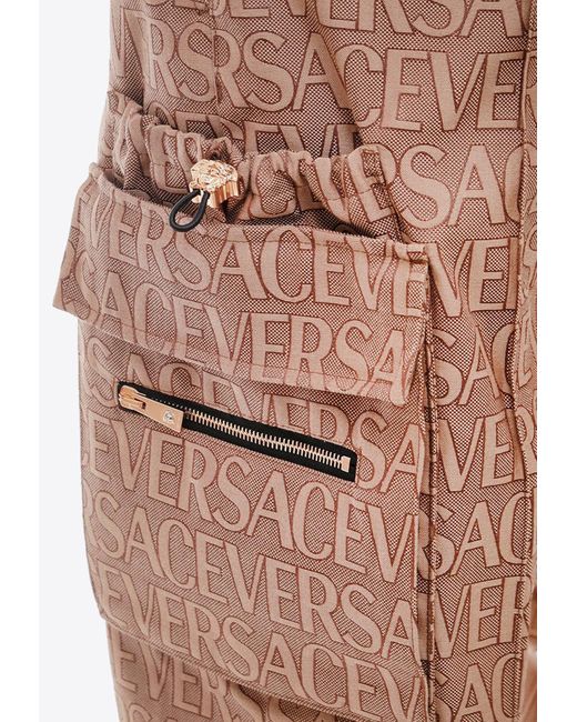 Versace Natural All-Over Logo Cargo Pants for men