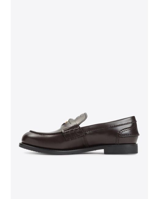 Miu Miu White Embossed Logo Penny Loafers