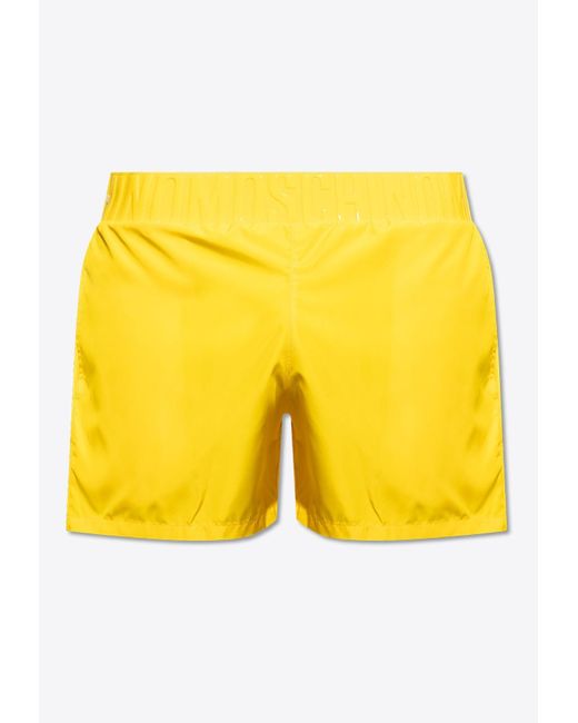 Moschino Yellow Rubberized Logo Swim Shorts for men