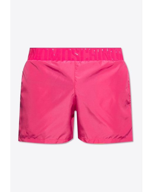 Moschino Pink Rubberized Logo Swim Shorts for men