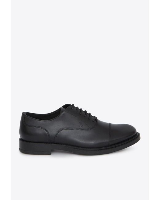 Tod's Black Logo-Embossed Oxford Shoes for men