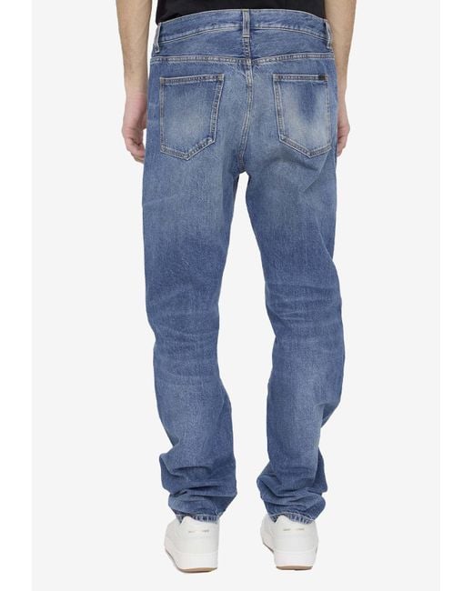 Saint Laurent Blue Low-Rise Washed-Out Jeans for men