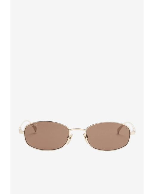 Gucci Brown Cut-Out Logo Oval Sunglasses
