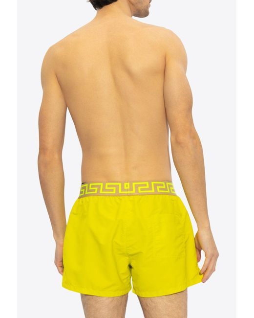 Versace Yellow Greca Swim Shorts for men
