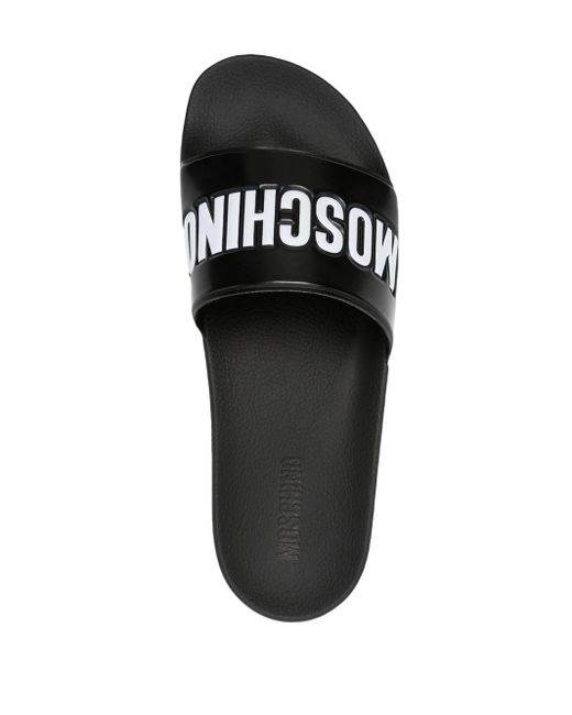 Moschino Black Slide Sandals With Embossed Logo for men