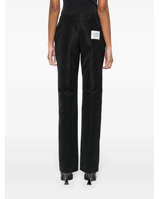Moschino Black Trousers With Patch Details
