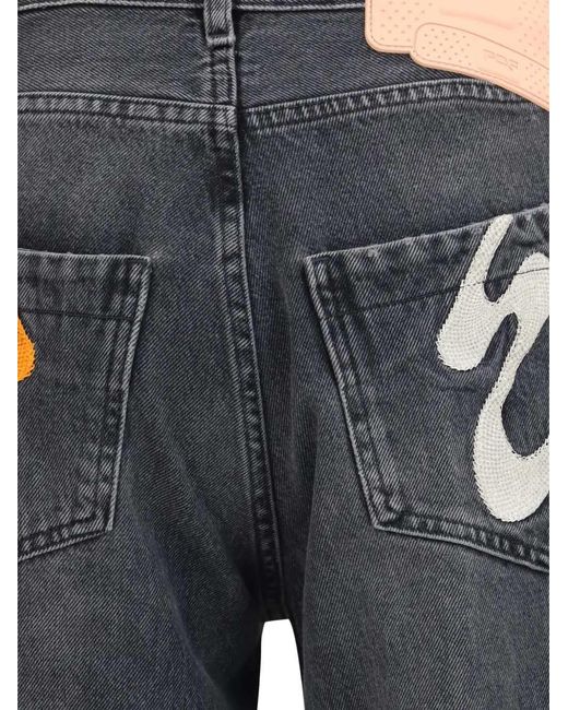 PDF Blue Jeans With Graphic Patches for men