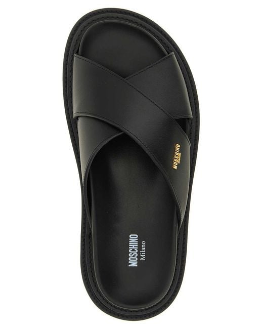 Moschino Black Leather Sabots With Logo