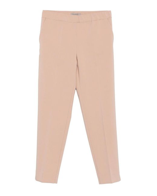 D. EXTERIOR Natural Trousers