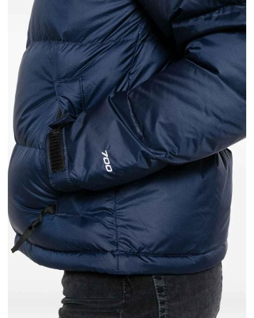 The North Face Blue Quilted Puffer Jacket With High Collar