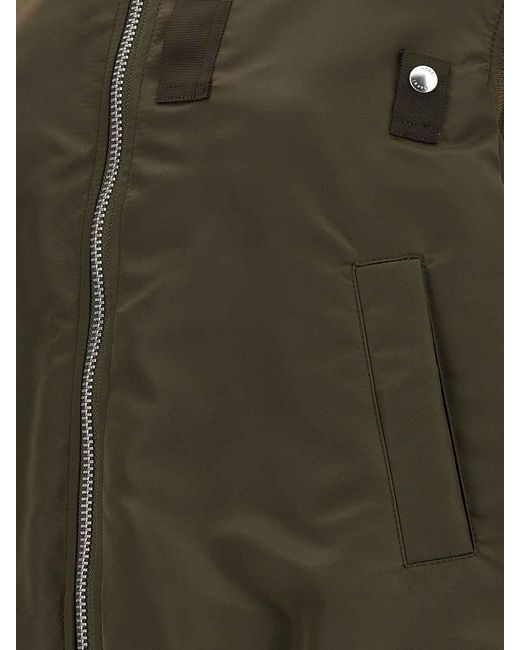Sacai Green Asymmetrical Hem Vest