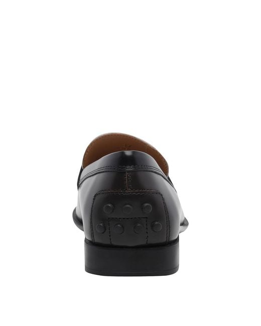 Tod's Black Leather Loafers