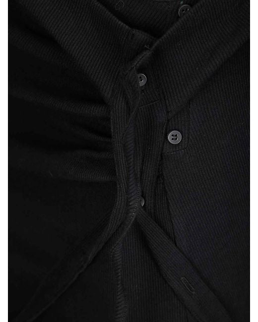 OTTOLINGER Black Asymmetrical Ribbed Mini Skirt With Ruffle Detail
