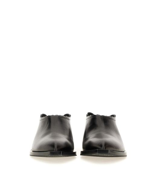 Moschino Black Camperos Tagliato