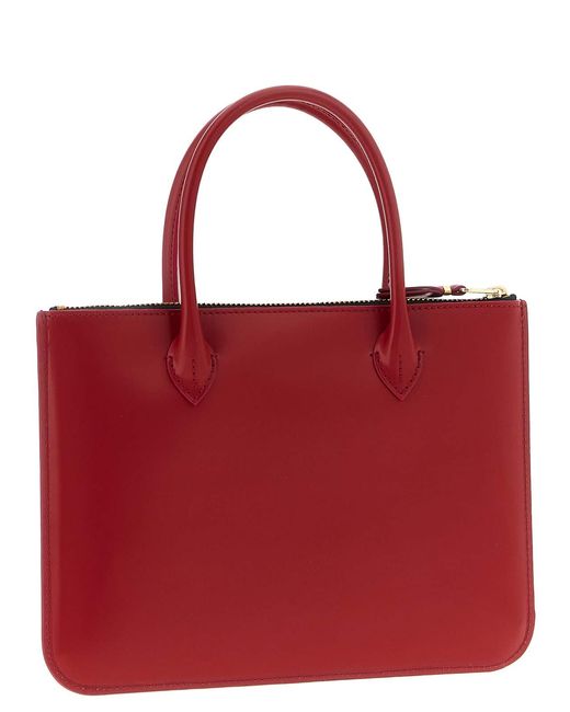 Comme des Garçons Red Handles