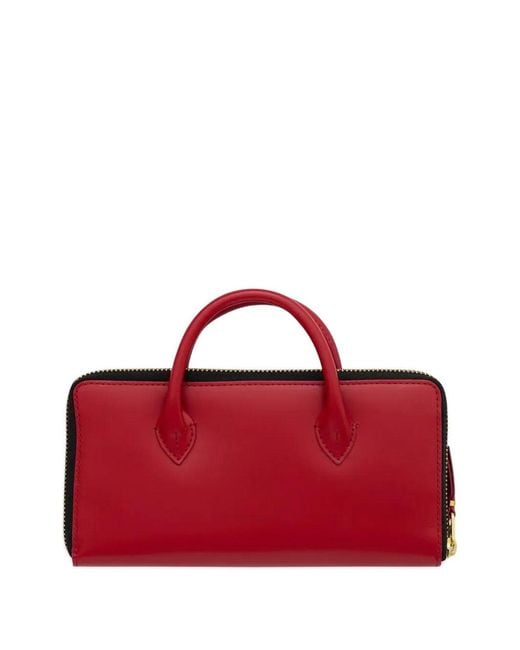 Comme des Garçons Red Handles