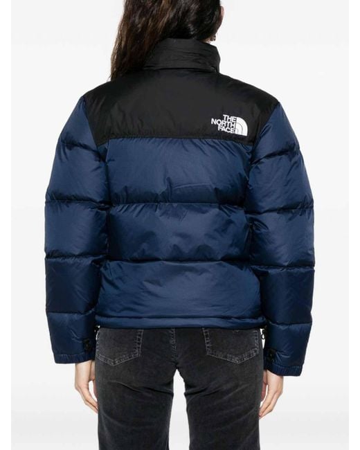 The North Face Blue Quilted Puffer Jacket With High Collar