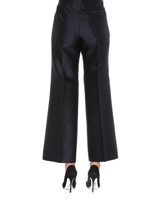【関税＆送料込み】Givenchy Wool Flared Trousers Mid-rise wool flared pants in black - Givenchy | Mytheresa