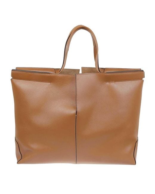 Tod's Brown Shopping Media