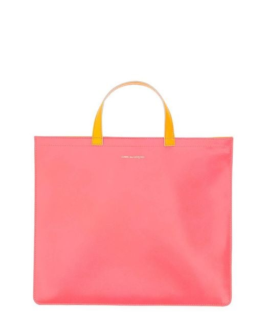 Comme des Garçons Yellow Totes