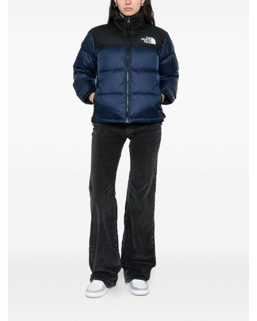 The North Face Blue Quilted Puffer Jacket With High Collar