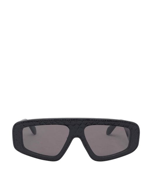 Alaïa Gray Logo Sunglasses