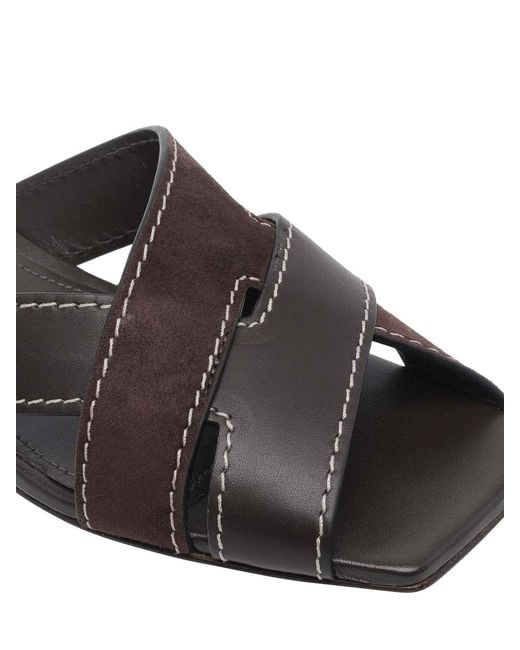 Tod's Black Flat Sandals