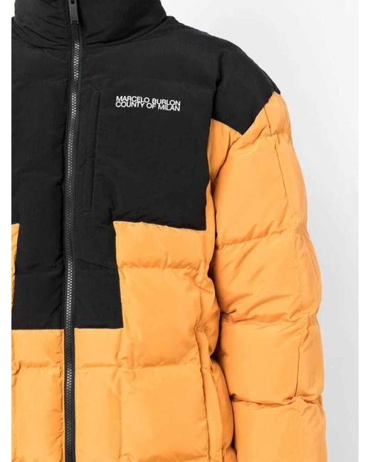 Marcelo Burlon Orange Logo Cross Block Puffer Jacket for men