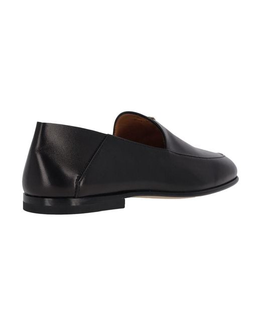 Tod's Black Lambskin Moccasins