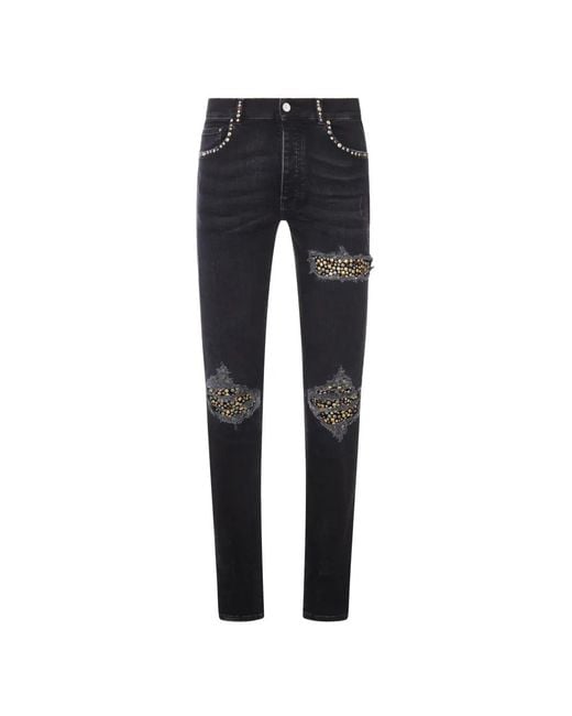 Amiri Blue Stud-Embellished Distressed Jeans for men