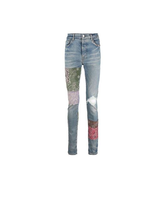 Amiri Blue Distressed Patchwork Skinny Jeans for men