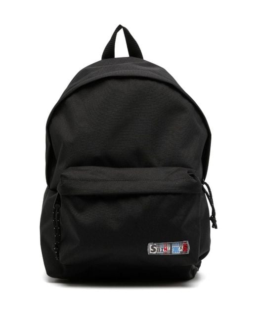 SAINT Mxxxxxx Black Logo-patch Backpack for men