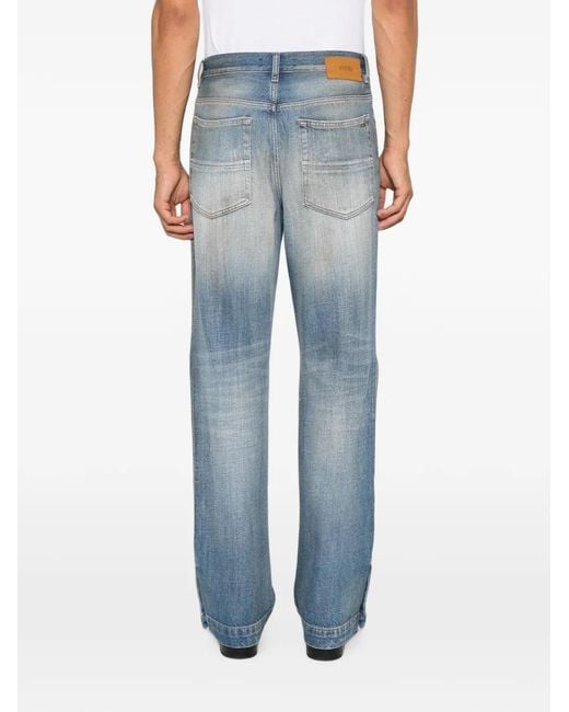 Amiri Blue Distressed Faded Jeans for men