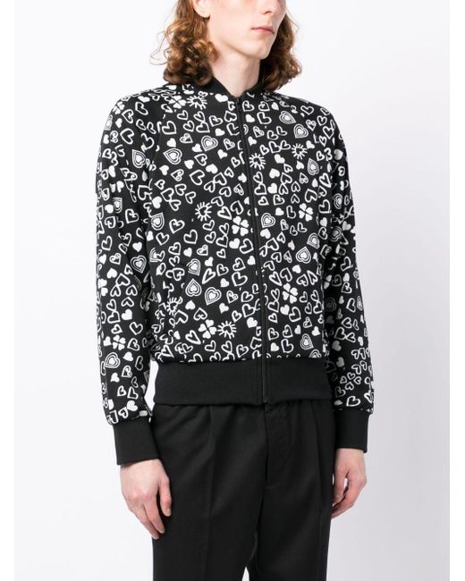 COMME DES GAR ON BLACK Heart print Zipped Bomber Jacket in Black