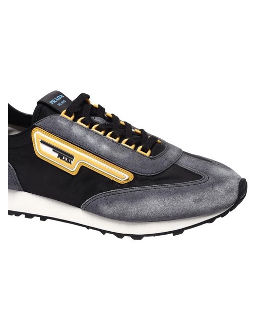 prada yellow and black sneakers