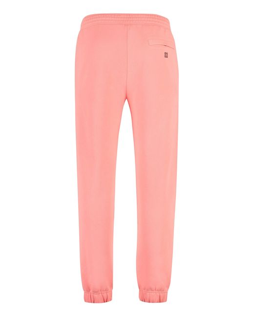 Pantaloni in felpa con logo di Givenchy in Red da Uomo