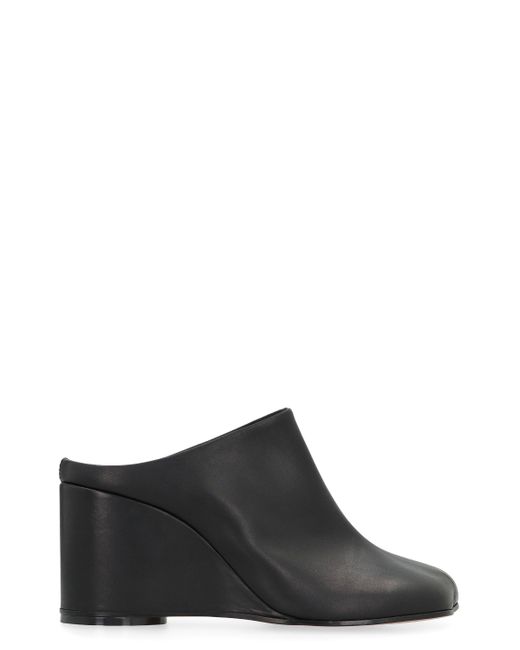 Mules in pelle di MM6 by Maison Martin Margiela in Black
