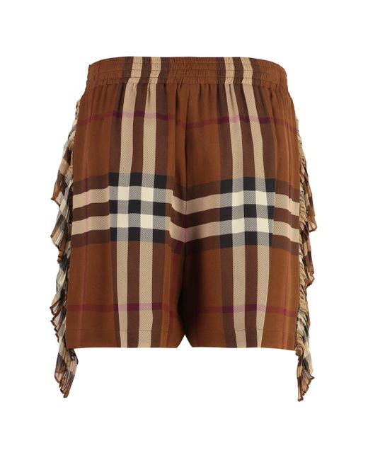 Shorts in motivo tartan di Burberry in Brown