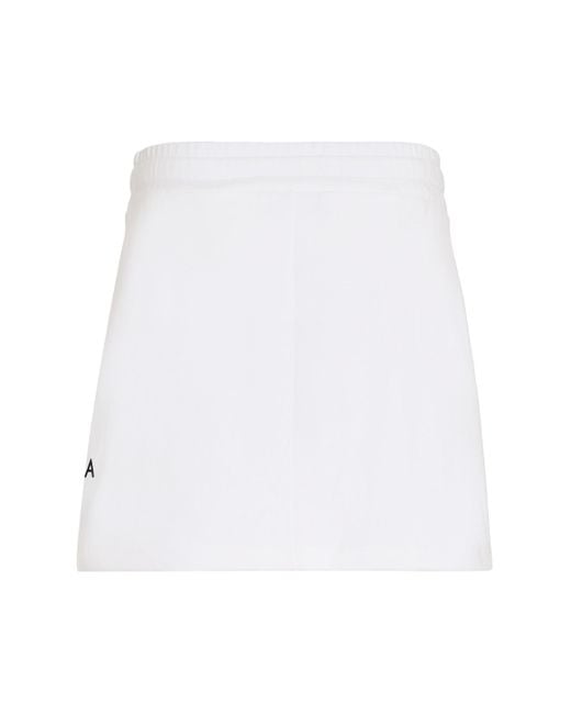 Minigonna in cotone di Dolce & Gabbana in White